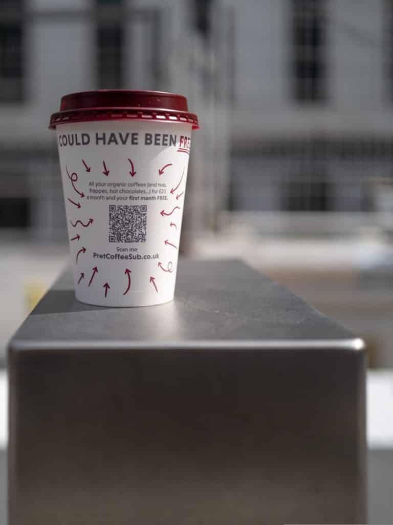 white and red plastic cup / Vcard qr code